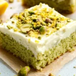 Lemon Pistachio Cake: A Zesty, Nutty Delight Lemon Pistachio Cake A slice of moist pistachio cake topped with creamy lemon frosting and crushed pistachios